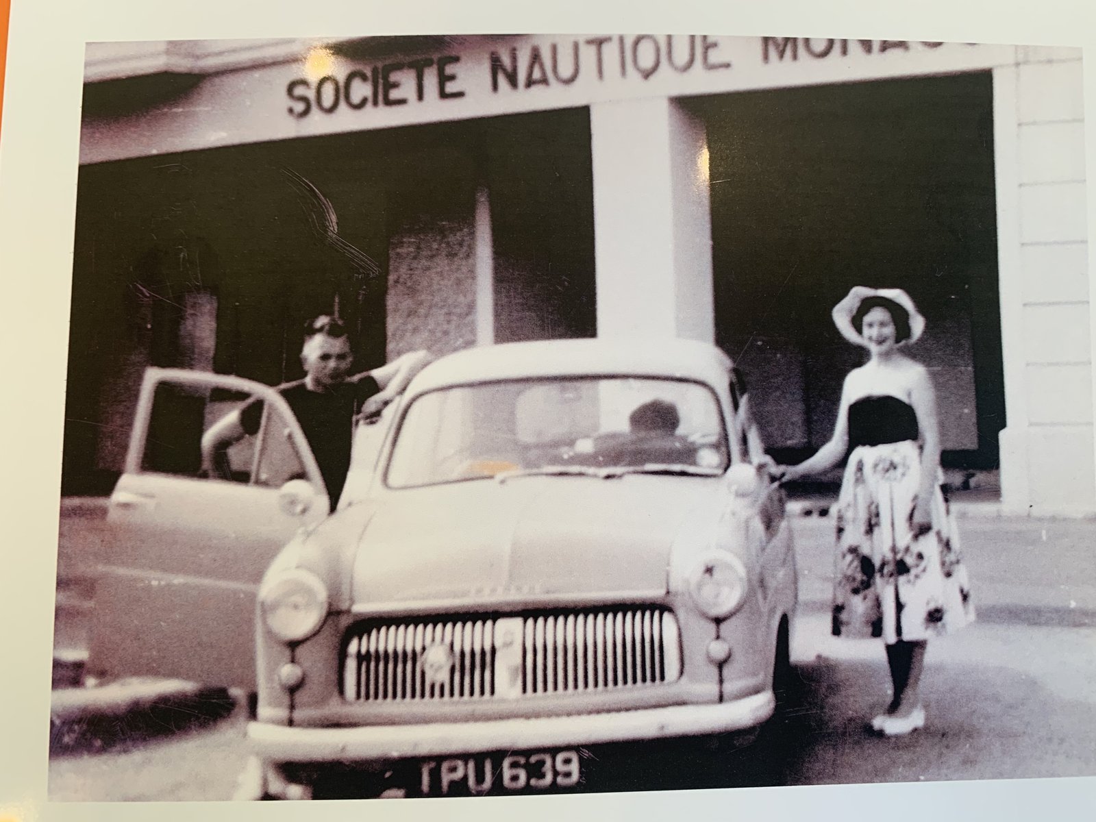 Dudley and Lydia Edmonds either side of their Mk1 Ford Consul outside the Monaco Yacht Club